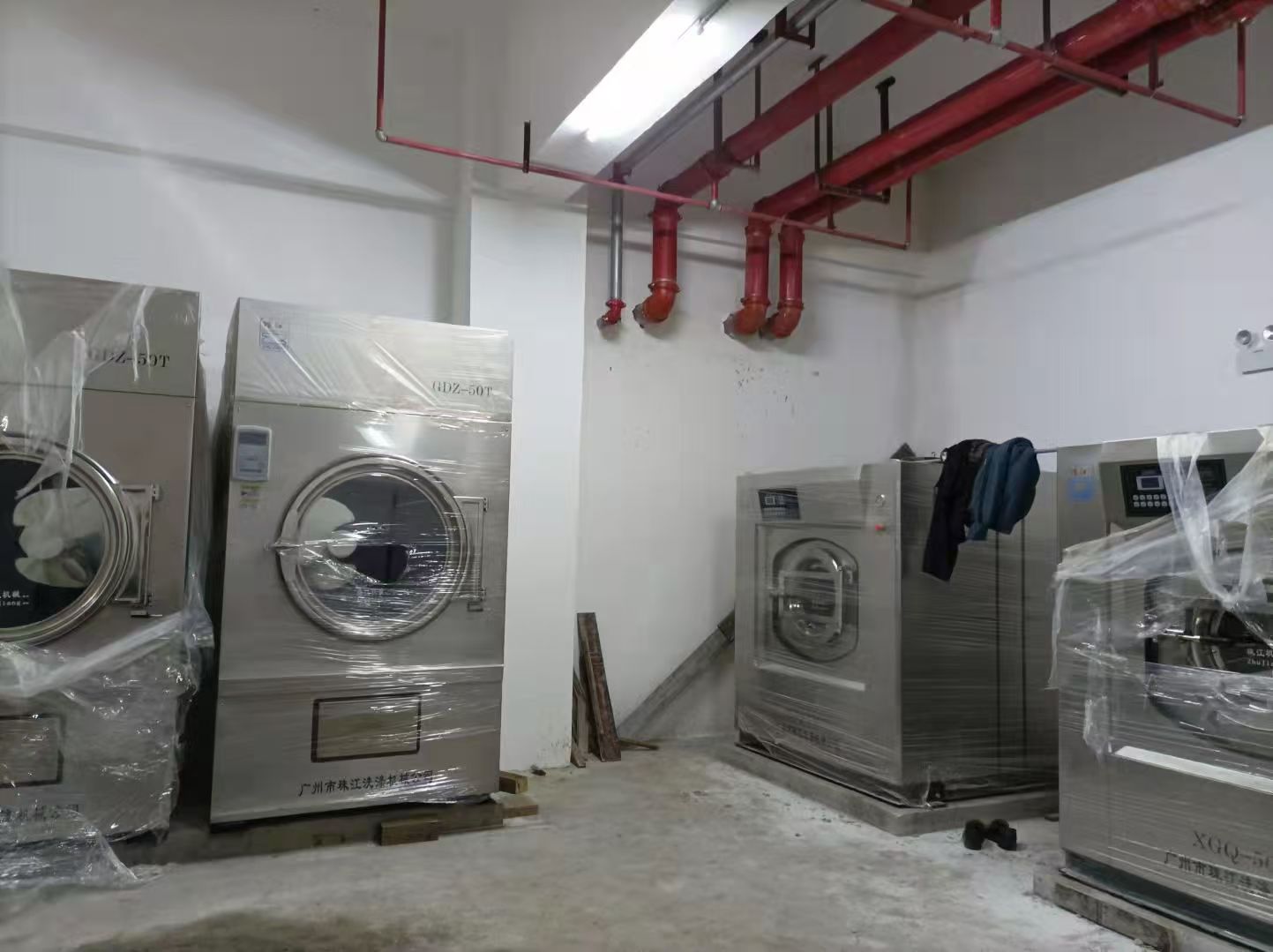 珠江洗滌設(shè)備為酒店提供高效廣州工業(yè)用洗衣機定制廠解決方案